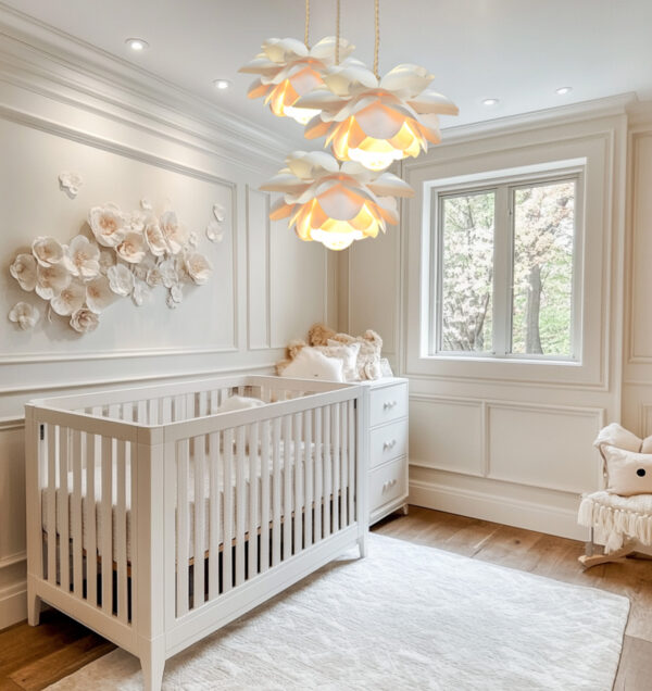 Elegant gold white floral pendant lights in baby nursery room