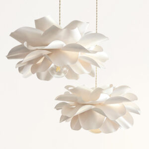 Soft ivory flower pendant lights set with sculptural layered petals